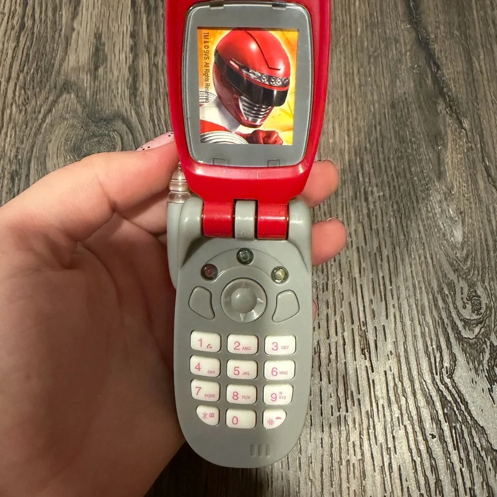 Source Unknown Red and Gray Flip Phone Toy with Red Ranger Graphic